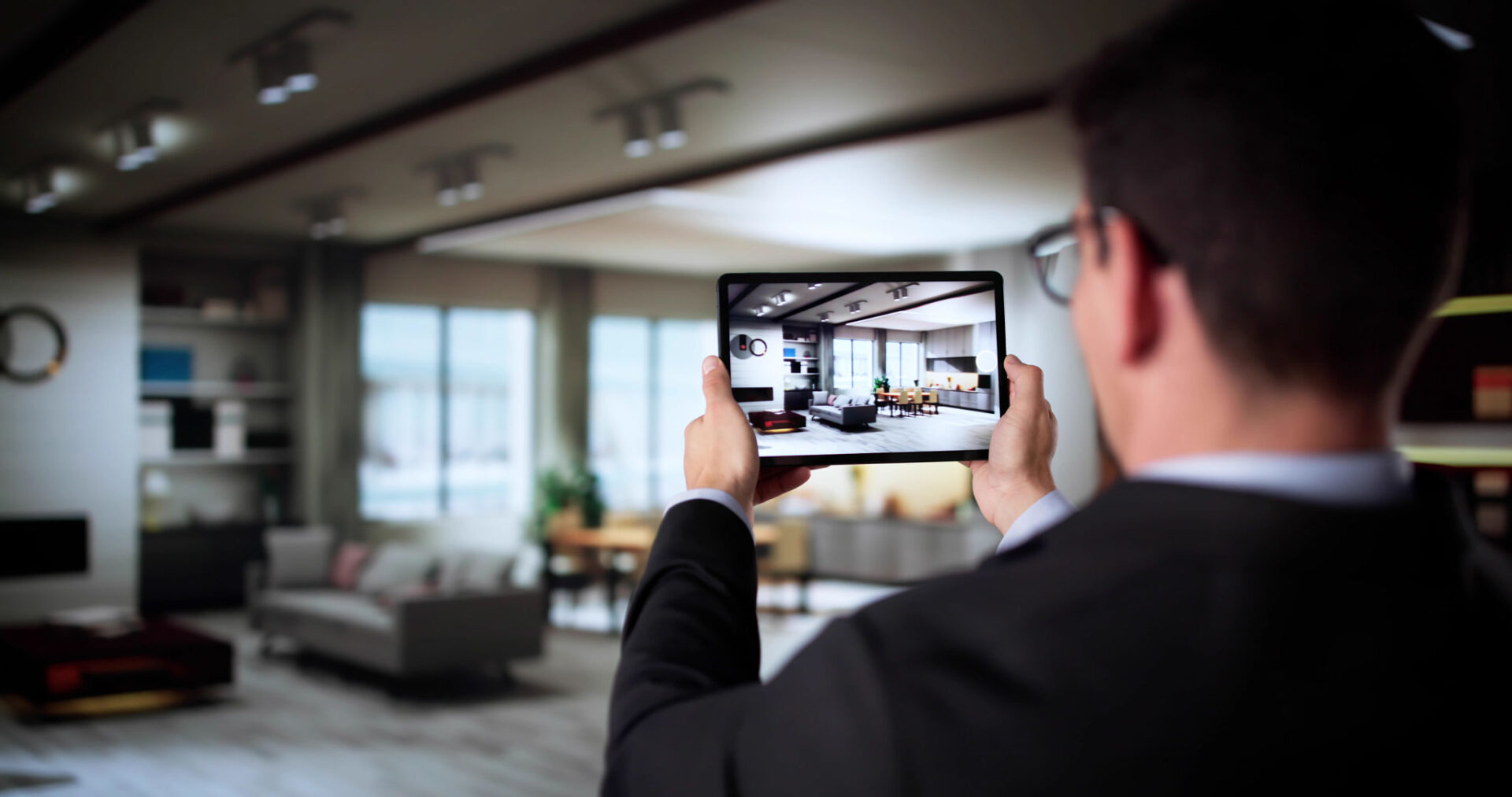 Person photographing living room with tablet