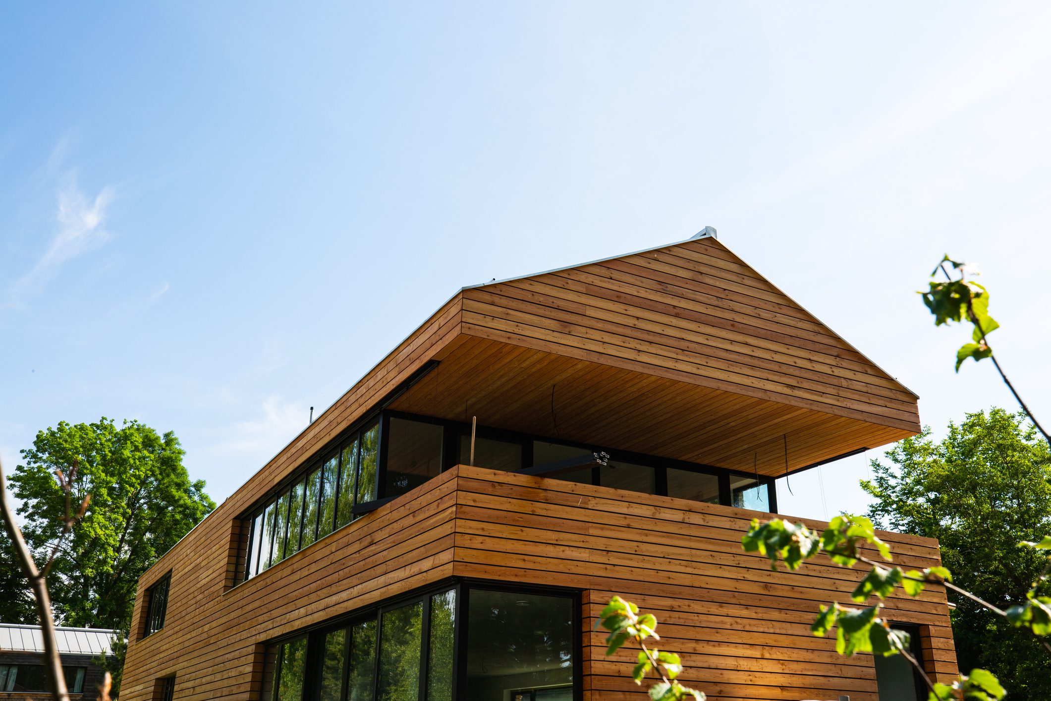 Modern wooden house with large glass windows